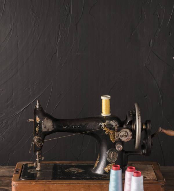 cotton-threads-near-sewing-machine